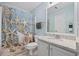 Bathroom with starfish-themed shower curtain and granite countertop at 4524 N Plantation Dr. # D9, Little River, SC 29566