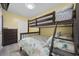 Bedroom with a bunk bed and dresser at 4524 N Plantation Dr. # D9, Little River, SC 29566