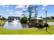 Relaxing gazebo overlooking a pond with fountain at 4524 N Plantation Dr. # D9, Little River, SC 29566