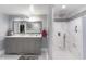 Elegant bathroom with gray double vanity and marble shower at 4705 Harness Ln., Murrells Inlet, SC 29576