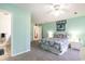 Serene bedroom with light teal walls and ceiling fan at 4705 Harness Ln., Murrells Inlet, SC 29576