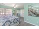 Bedroom with light teal walls and ceiling fan at 4705 Harness Ln., Murrells Inlet, SC 29576