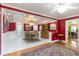 Formal dining room with hardwood floors and access to other rooms at 4705 Harness Ln., Murrells Inlet, SC 29576