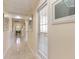 Bright hallway with tile flooring and framed artwork at 4705 Harness Ln., Murrells Inlet, SC 29576