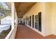 Side porch view with access to garage and backyard at 4705 Harness Ln., Murrells Inlet, SC 29576