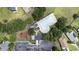 Aerial view showcasing the pool, playground, picnic area, and surrounding lush greenery at 4821 Southgate Pkwy., Myrtle Beach, SC 29579