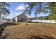 The large backyard features a white fence, offering privacy and space for outdoor activities and relaxation at 4821 Southgate Pkwy., Myrtle Beach, SC 29579