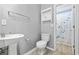 A half bathroom featuring a vanity with an above cabinet and a shower with a curtain at 4821 Southgate Pkwy., Myrtle Beach, SC 29579