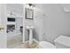 This half bathroom features a pedestal sink and is located off of the main living area at 4821 Southgate Pkwy., Myrtle Beach, SC 29579