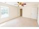 A bedroom featuring a ceiling fan, white walls, and carpeted floors at 4821 Southgate Pkwy., Myrtle Beach, SC 29579