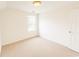 A spare bedroom featuring a neutral carpet flooring, one window for natural light, and a double door closet at 4821 Southgate Pkwy., Myrtle Beach, SC 29579