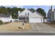 Charming two-story home featuring a white picket fence and two-car garage at 4821 Southgate Pkwy., Myrtle Beach, SC 29579