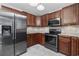 Modern kitchen featuring stainless steel appliances and beautiful wood cabinets at 4821 Southgate Pkwy., Myrtle Beach, SC 29579