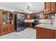 Well-equipped kitchen with stainless steel appliances and rich wood cabinetry at 4821 Southgate Pkwy., Myrtle Beach, SC 29579