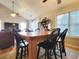 Bright dining area with a wooden table and four chairs at 49 Daniel Morrall Ln., Georgetown, SC 29440