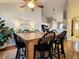 Dining area with a farmhouse table and black chairs at 49 Daniel Morrall Ln., Georgetown, SC 29440