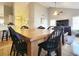 Charming dining area with a rustic wooden table and black chairs at 49 Daniel Morrall Ln., Georgetown, SC 29440