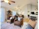 Open living room with leather armchairs, a dining area, and hardwood floors at 49 Daniel Morrall Ln., Georgetown, SC 29440