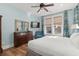 Bright bedroom featuring a king-size bed and ample natural light at 4918 Old Appleton Way, North Myrtle Beach, SC 29582