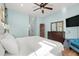 Spacious bedroom with large bed, dresser, and TV at 4918 Old Appleton Way, North Myrtle Beach, SC 29582