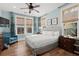 Comfortable main bedroom with king-size bed and blue accents at 4918 Old Appleton Way, North Myrtle Beach, SC 29582