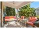 Relaxing patio with striped furniture, perfect for outdoor enjoyment at 4918 Old Appleton Way, North Myrtle Beach, SC 29582