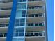 Close-up view of building exterior, showcasing balconies and windows at 504 N Ocean Blvd. # 1003, Myrtle Beach, SC 29577