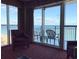 Oceanfront living room with balcony access at 504 N Ocean Blvd. # 1003, Myrtle Beach, SC 29577