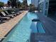 Resort-style pool with lounge chairs and hot tub at 504 N Ocean Blvd. # 1003, Myrtle Beach, SC 29577