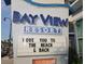 Bayview Resort sign with a beach-themed message welcoming guests at 504 N Ocean Blvd. # 1003, Myrtle Beach, SC 29577