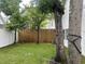 Small backyard with trees and grass at 506-B Rosemary Ln., North Myrtle Beach, SC 29582