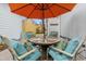 Cozy patio with table and chairs, perfect for dining al fresco at 506-B Rosemary Ln., North Myrtle Beach, SC 29582