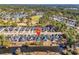 Aerial view of a property in a leafy community, showing its proximity to a pond and golf course at 541 Sand Ridge Rd., Conway, SC 29526