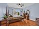 Bright bedroom with hardwood floors and a king-size bed at 541 Sand Ridge Rd., Conway, SC 29526