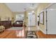 Bright entryway with hardwood floors, a chandelier, and seating area at 541 Sand Ridge Rd., Conway, SC 29526