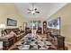 Bright living room with modern rug, large TV, and comfortable seating area at 541 Sand Ridge Rd., Conway, SC 29526