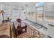 Relaxing sunroom with plenty of natural light and comfortable seating at 541 Sand Ridge Rd., Conway, SC 29526