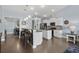 Modern kitchen with white cabinets, granite countertops, and kitchen island at 5522 Elba Way # 5522, Myrtle Beach, SC 29579