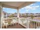 Balcony view of the community pool and surrounding buildings at 5751 Oyster Catcher Dr. # 931, North Myrtle Beach, SC 29582