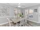 Dining area with a glass-top table and white chairs at 6001-1027 S Kings Hwy., Myrtle Beach, SC 29575