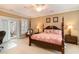 Spacious bedroom with king-size bed, access to patio, and ample natural light at 6244 Catalina Dr. # 1411, North Myrtle Beach, SC 29582