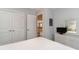 Light-filled bedroom featuring a white dresser and mirror, offering a comfortable and stylish space at 6244 Catalina Dr. # 1411, North Myrtle Beach, SC 29582