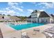 Relaxing community pool with plenty of lounge chairs for sunbathing at 6244 Catalina Dr. # 1411, North Myrtle Beach, SC 29582