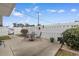 Private backyard patio with metal table and chairs at 676 Pelican Ave. # 676, Myrtle Beach, SC 29577