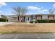 Brick ranch house with carport and landscaped yard at 676 Pelican Ave. # 676, Myrtle Beach, SC 29577