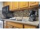 Clean kitchen featuring stainless steel sink and microwave at 6804 N Ocean Blvd. # 1117, Myrtle Beach, SC 29572