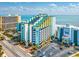 Aerial view of oceanfront resort, showing building, parking, and beach at 6804 N Ocean Blvd. # 1637, Myrtle Beach, SC 29572