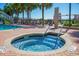 Relaxing hot tub surrounded by palm trees and lounge chairs at 6804 N Ocean Blvd. # 1637, Myrtle Beach, SC 29572