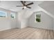 Bright bedroom with angled ceiling and large windows offers a cozy and inviting atmosphere at 7053 Byrnes Ln., Myrtle Beach, SC 29588
