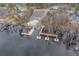 Aerial view of boat ramp and dock area offering residents access to the waterway, with convenient parking and pier at 7053 Byrnes Ln., Myrtle Beach, SC 29588